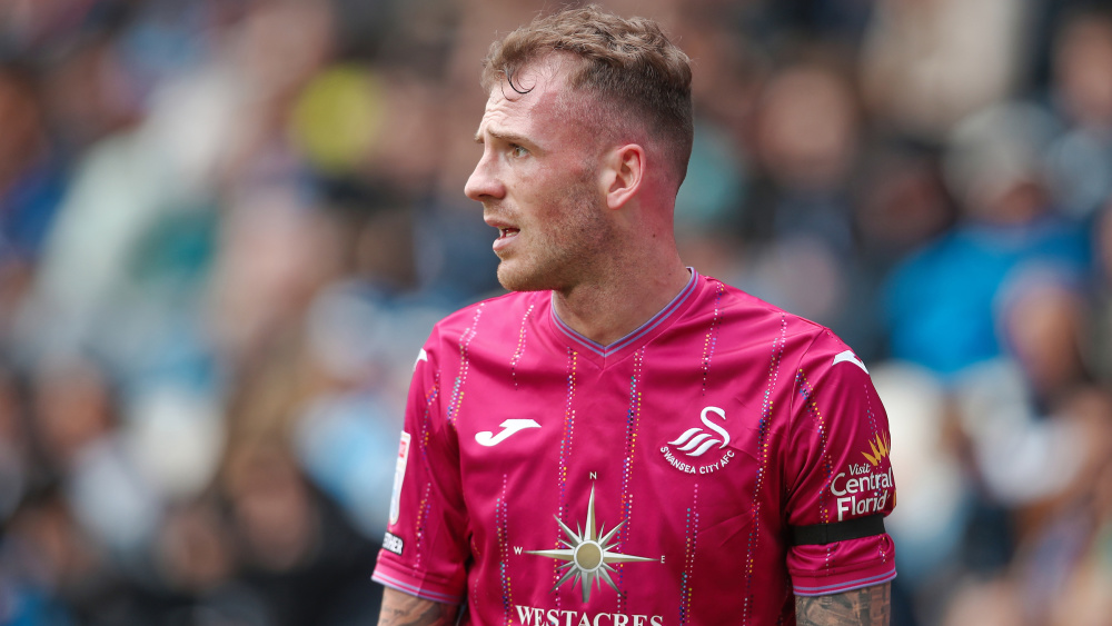 狼队客场逼平斯旺西，保持积分榜上升